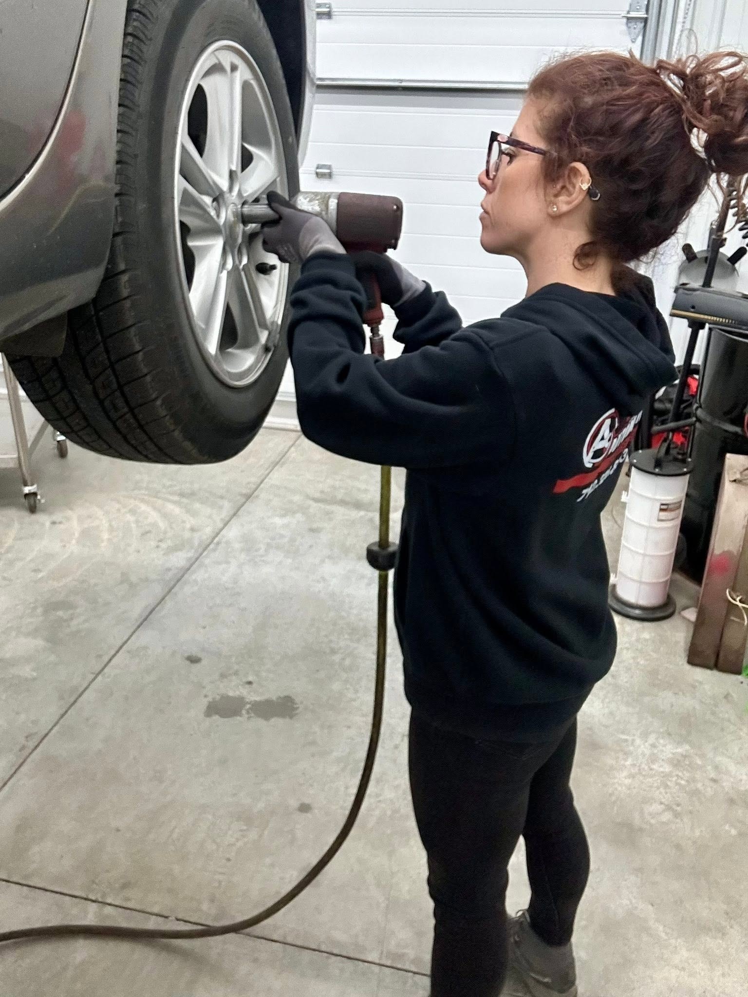 Mechanic repairing a car brake